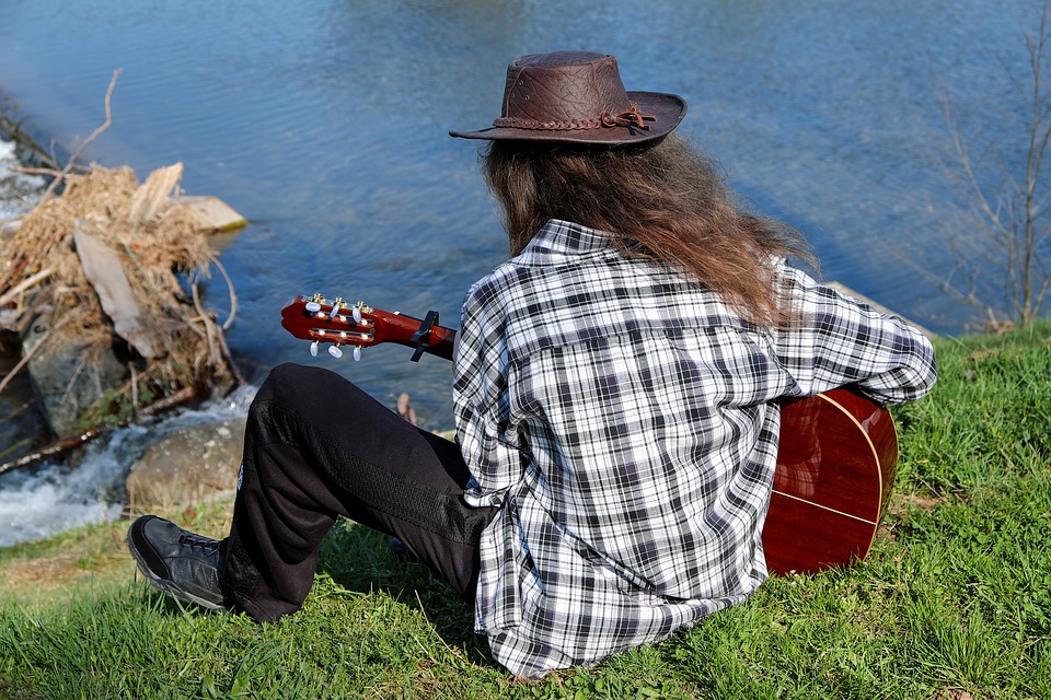 man playing guitar